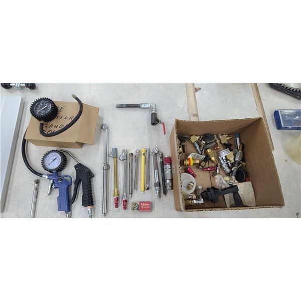 BOX OF TIRE GUAGES AND HOSES