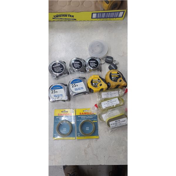 LOT OF TAPE MEASSURE AND SELF ADHESIVE JIG TAPE RIGHT TO LEFT AND ONE LEFT TO RIGHT