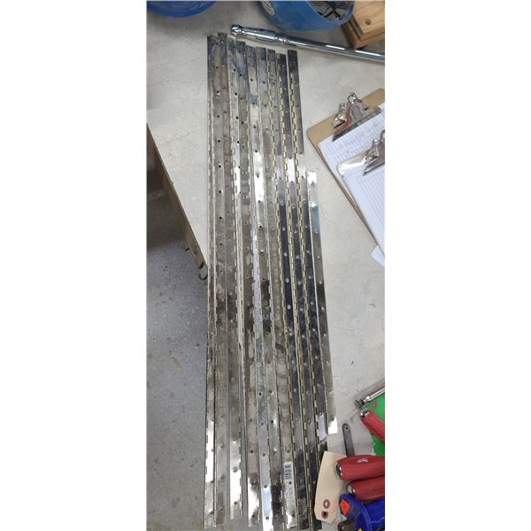 NINE NICKEL 36" X 1 1/2" CONTINUOUS BRACKET HINGES AND THREE DARK BRASS COLOURED HINGES