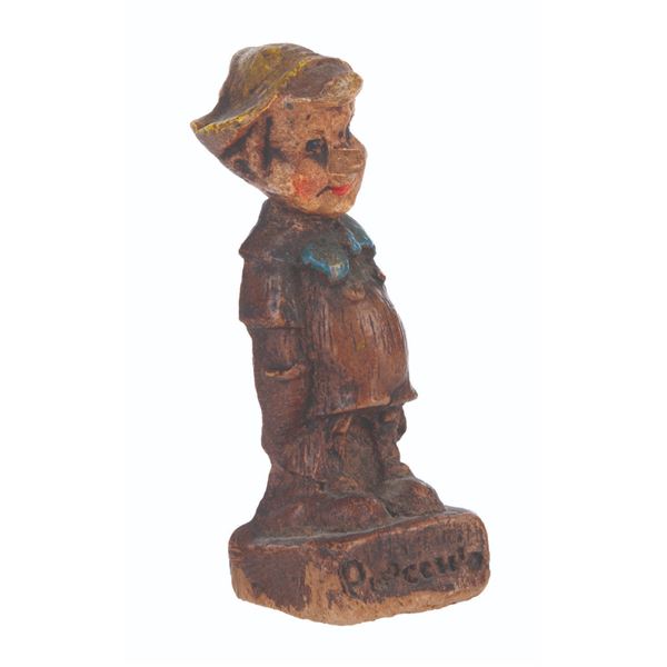 A 1940s Multi Products Pinocchio Figurine.