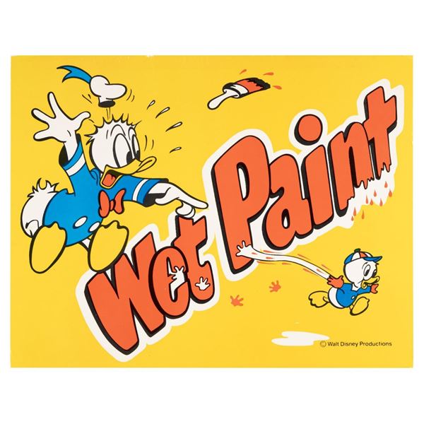 A Disneyland Donald Duck Wet Paint Sign.