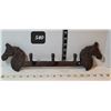 Image 1 : Cast iron horse head coat hooks.
