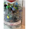 Image 3 : Large 3 litre Smirnoff vodka bottle filled with 350 marbles.