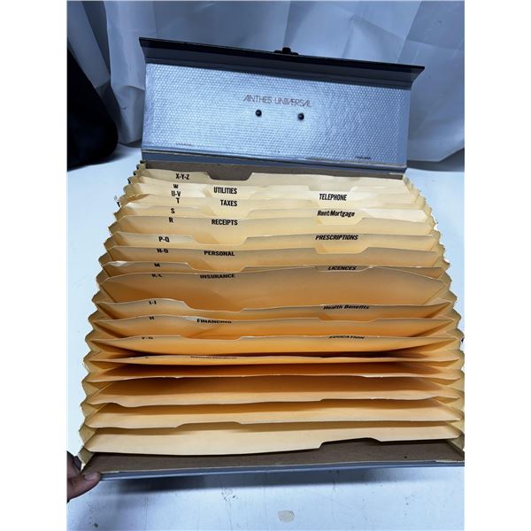 Expanding accordian portable file folder.