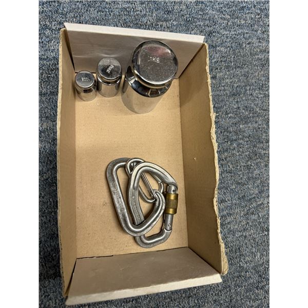 Scale, weights, and carabiners