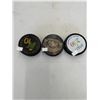 Image 1 : Hockey pucks