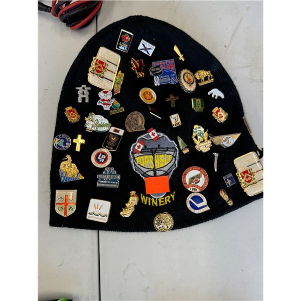 Assorted pins on toque