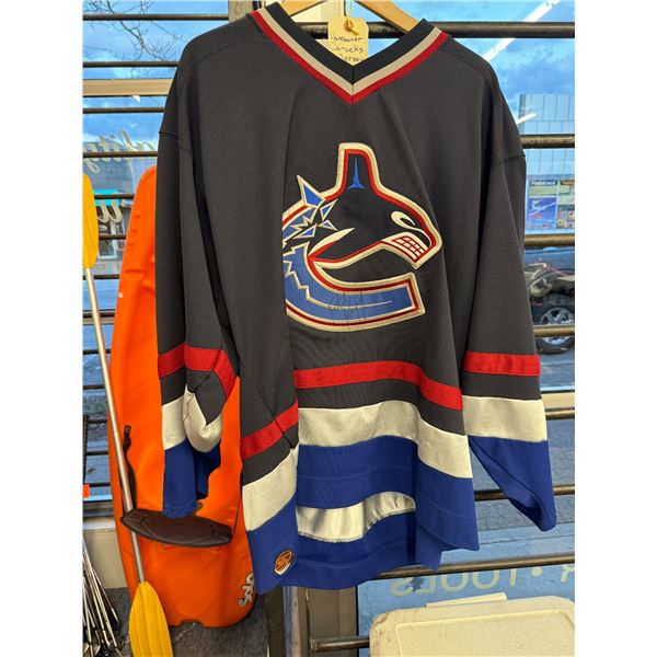 Canucks jersey with signature? XL