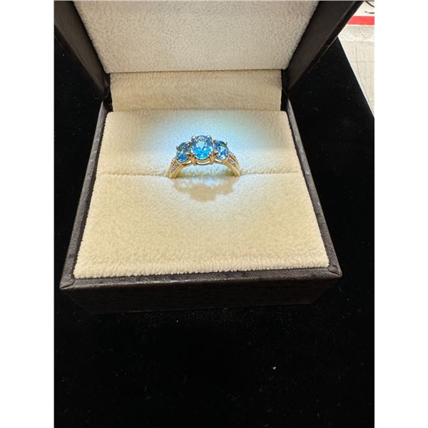 3 blue stones 10k 3.5g ring