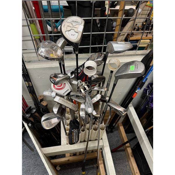 Lot of clubs and putters