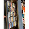 Image 1 : Shelf of DVDs