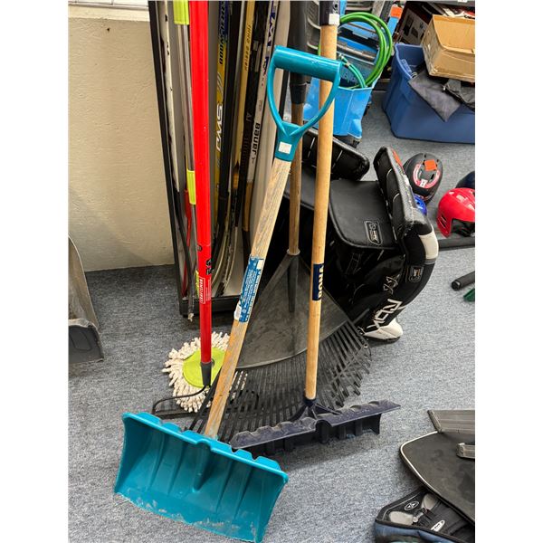 4 yard tools and a mop