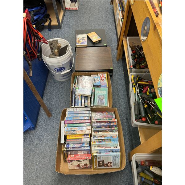 2 VHS storages and 2 boxes of VHS