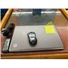 Image 1 : Laptop HP and mouse