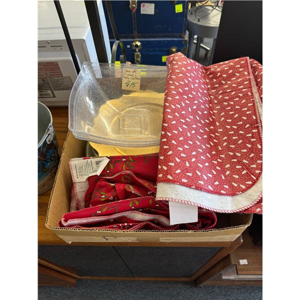 Box of dishes and table clothes