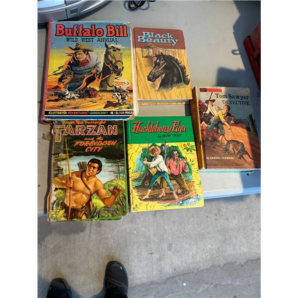 Tom Sawyer, Black beauty, Buffalo, Bill, Tarzan, and Huckleberry Finn books