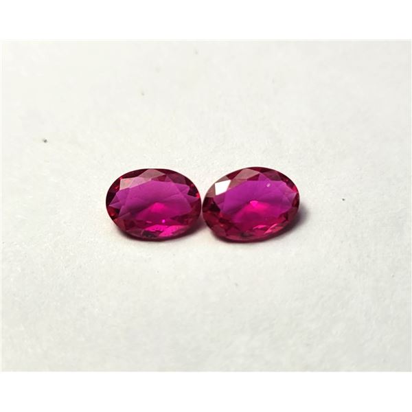 8)  LOT OF 2 OVAL MATCHED RUBY GEMSTONES, TOTAL OF