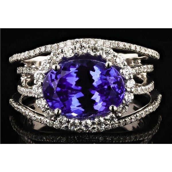 4.26CT TANZANITE & 0.84CTW DIAMOND PLATINUM RING