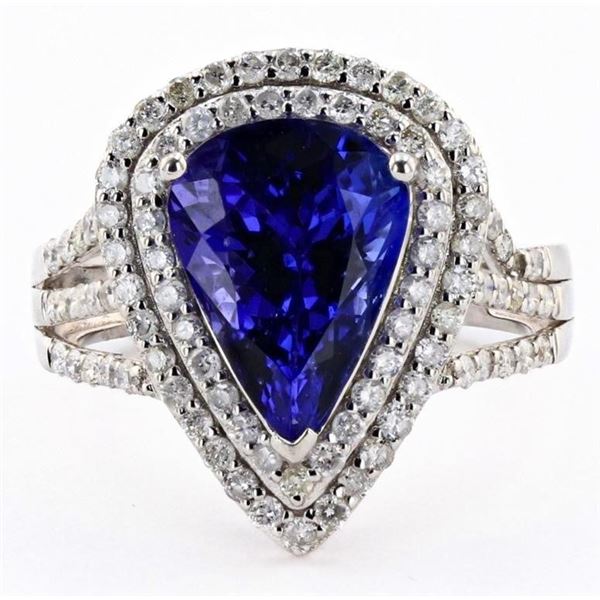 4.32CT TANZANITE & 0.81CTW DIAMOND PLATINUM RING