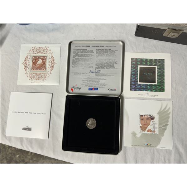 The official millennium keepsake stamp and quarter