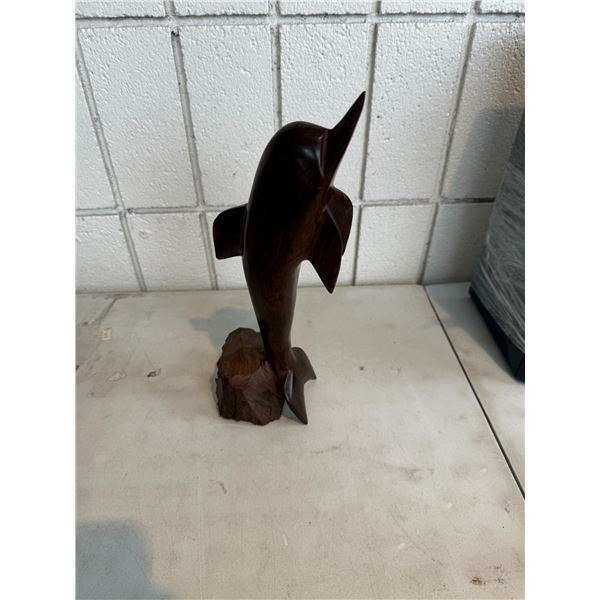 Carved dolphin