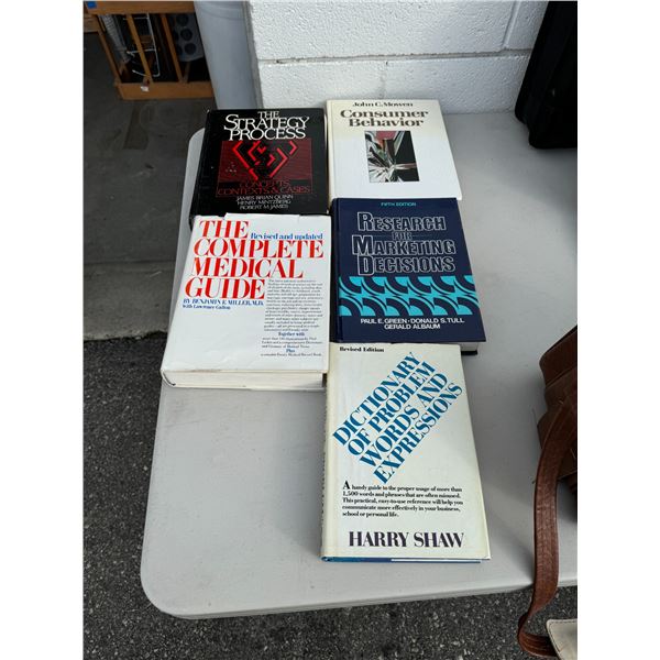 Assortment of books, marketing, and other