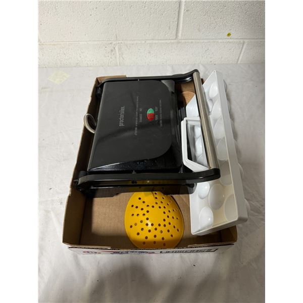 Electric grill, egg holder