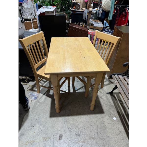 Table and two chairs table measures 41 and three-quarter inches by 26" x 29" tall