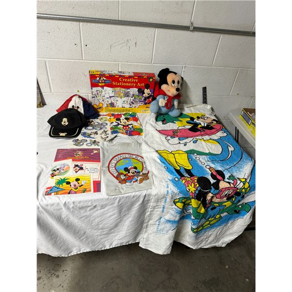 Mickey mouse collectibles hats, beach towel, stationary art, etc.