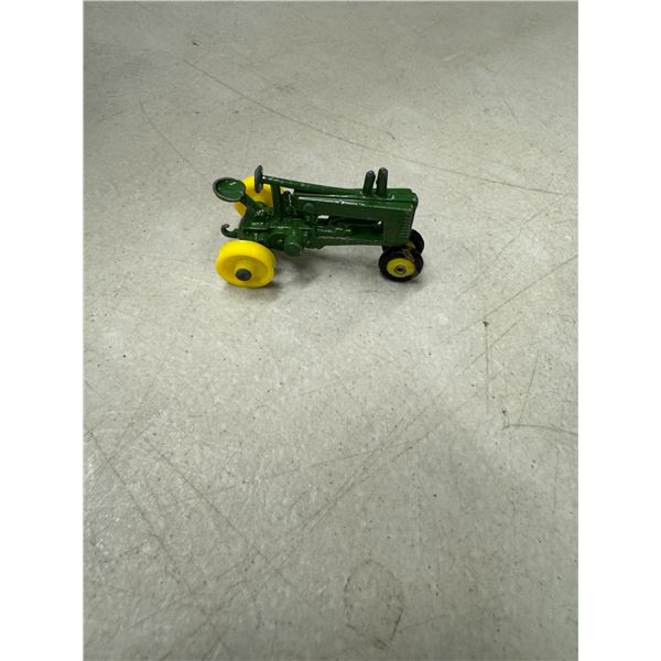 Small John Deere diecast tractor