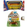 Image 2 : Assortment Of Vintage Miniature Cars, Corgi Disneyland Bus, Grip, Dandy, Ertl Smurf, Etc..