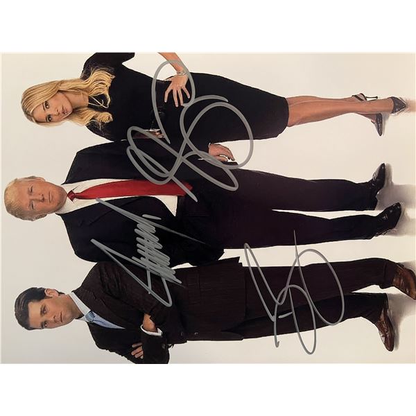 Donald Trump, Donald Trump Jr. and Ivanka Trump signed photo.