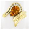 Image 1 : 18k Yellow Gold 1.98 ctw Pear Cut Citrine & Channel Diamond Grooved Bypass Ring