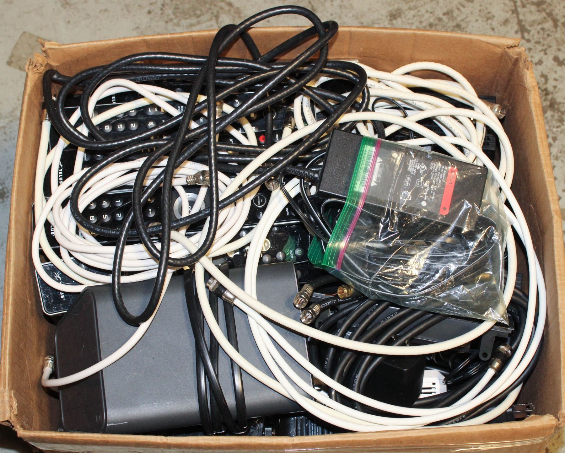 Modem Wire Box BOX OF TELUS MODEMS, CABLE BOXES, AND WIRES