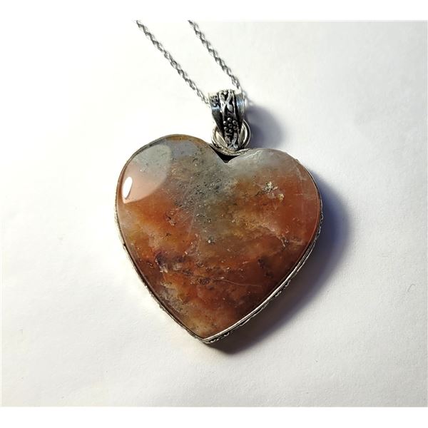 30)  NATURAL HEART SHAPED JASPER PENDANT WITH AN
