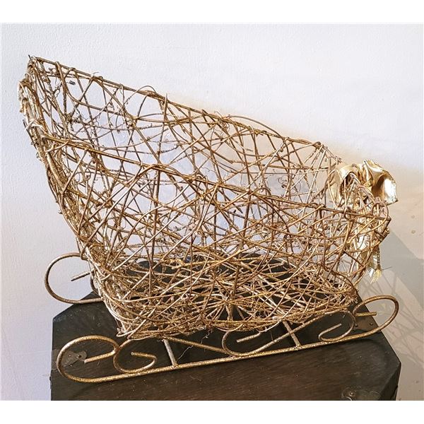 25)  GOLD TONE SANTA'S SLEIGH, 9" TALL @ HIGHEST