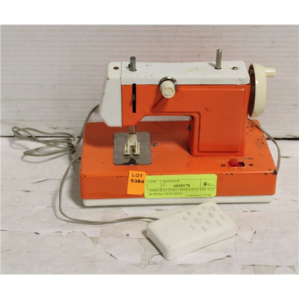 1960S BATTERY OPERATED TIN TOY SEWING MACHINE