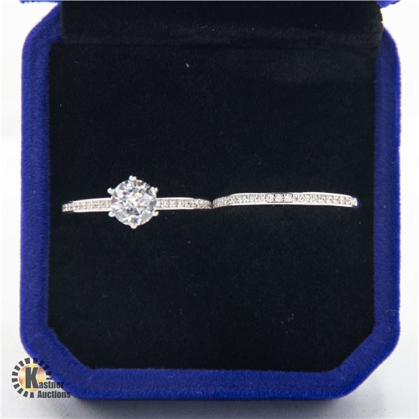 #987-HAND SET 0.80 CT TW ROUND BRILLIANT CUT
