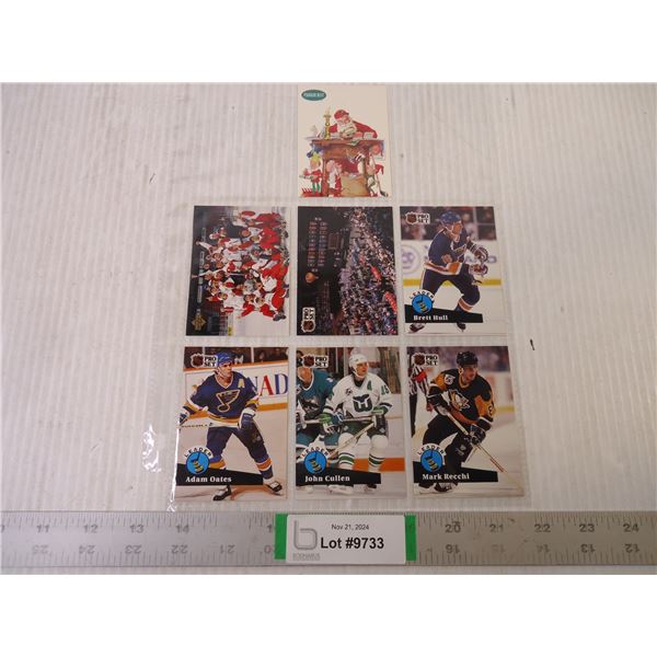 (7) Assorted Hockey Cards including Santa Claus, Adam Oates, Brett Hull 1991to 93