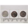 Image 2 : Three Canadian Voyageur silver dollar coins including 1935, 1936, and 1937