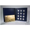 Image 1 : Album containing twenty four sterling silver medallions "The Great Canadians" minted by Wellings Min