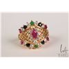 Image 2 : Tested 18kt yellow gold ring set with gemstone/ gemstone like stones, size 4.5, note: center ring ca