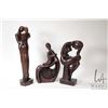 Image 1 : Three carved figures including mother and child, embracing couple and a nude woman, sizes ranging fr