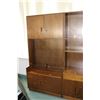 Image 1 : Mid century one piece wall unit with two doors on top and bottom and dowel style shelf in middle, 75