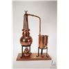 Image 1 : AL- Ambiq copper whisky still with spirit burner on wooden base, 17" in height
