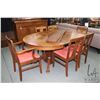 Image 1 : Round Mission style, split pedestal oak dining table 45" in diameter. Includes five 9" insert leaved