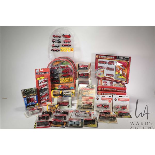 Large selection of new in box die-cast cars and trucks, various scales and makers