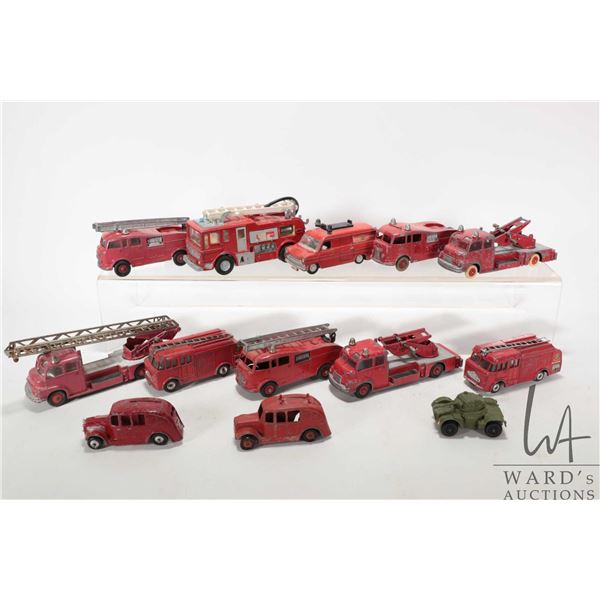 Thirteen die cast Dinky toys including fire engines, cars and a small tank