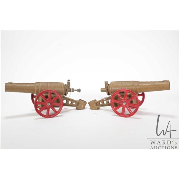 Two Conestoga Big Bang F-6 cannon toys, each 9" in length with 3" wheels, note: one missing firing m