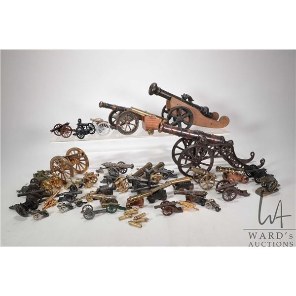 Tray lot of collectible metal cannons, various materials and styles